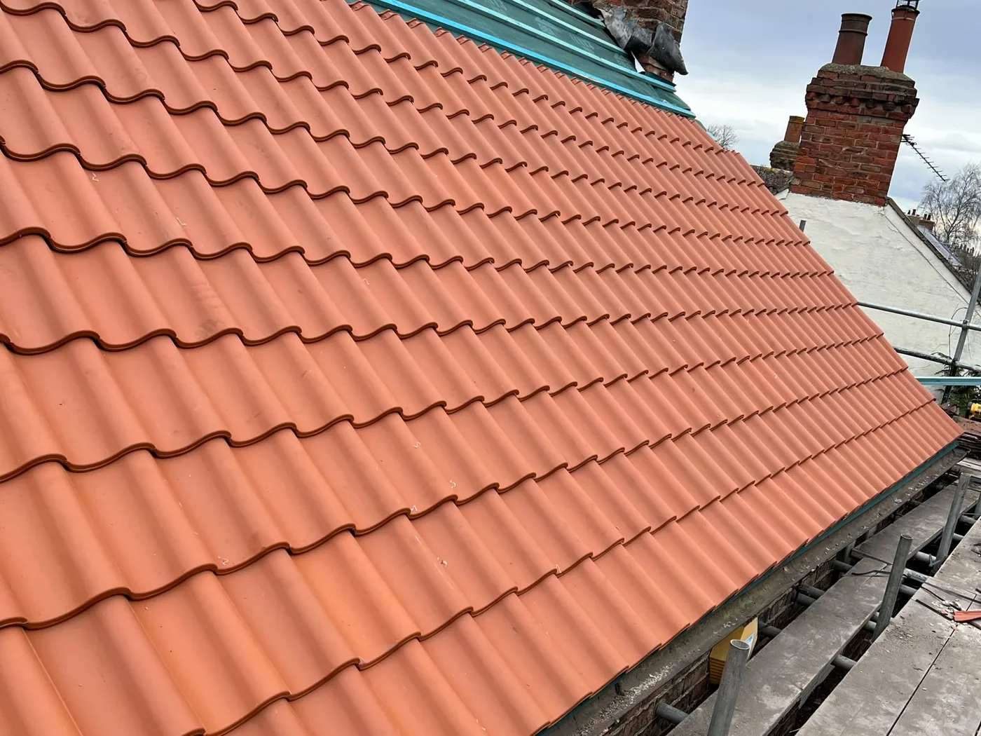 Pantile roof and brick chimney